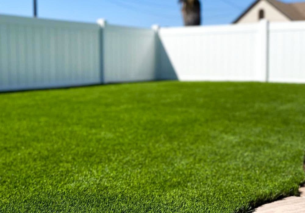 an image of a synthetic turf inside a fence